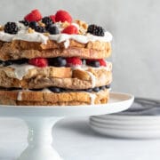decorated french toast cake on a cake stand