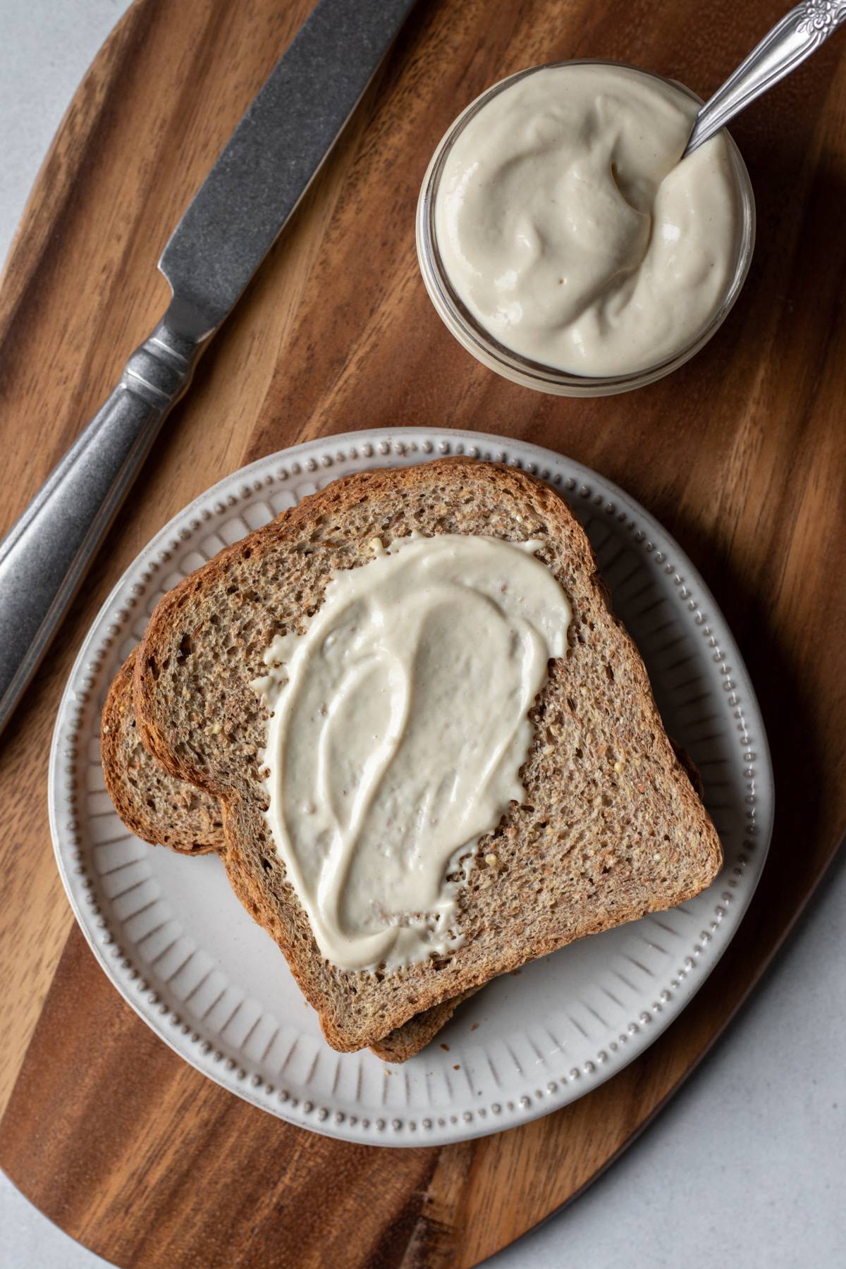 overhead shot of oil-free mayo spread on bread.