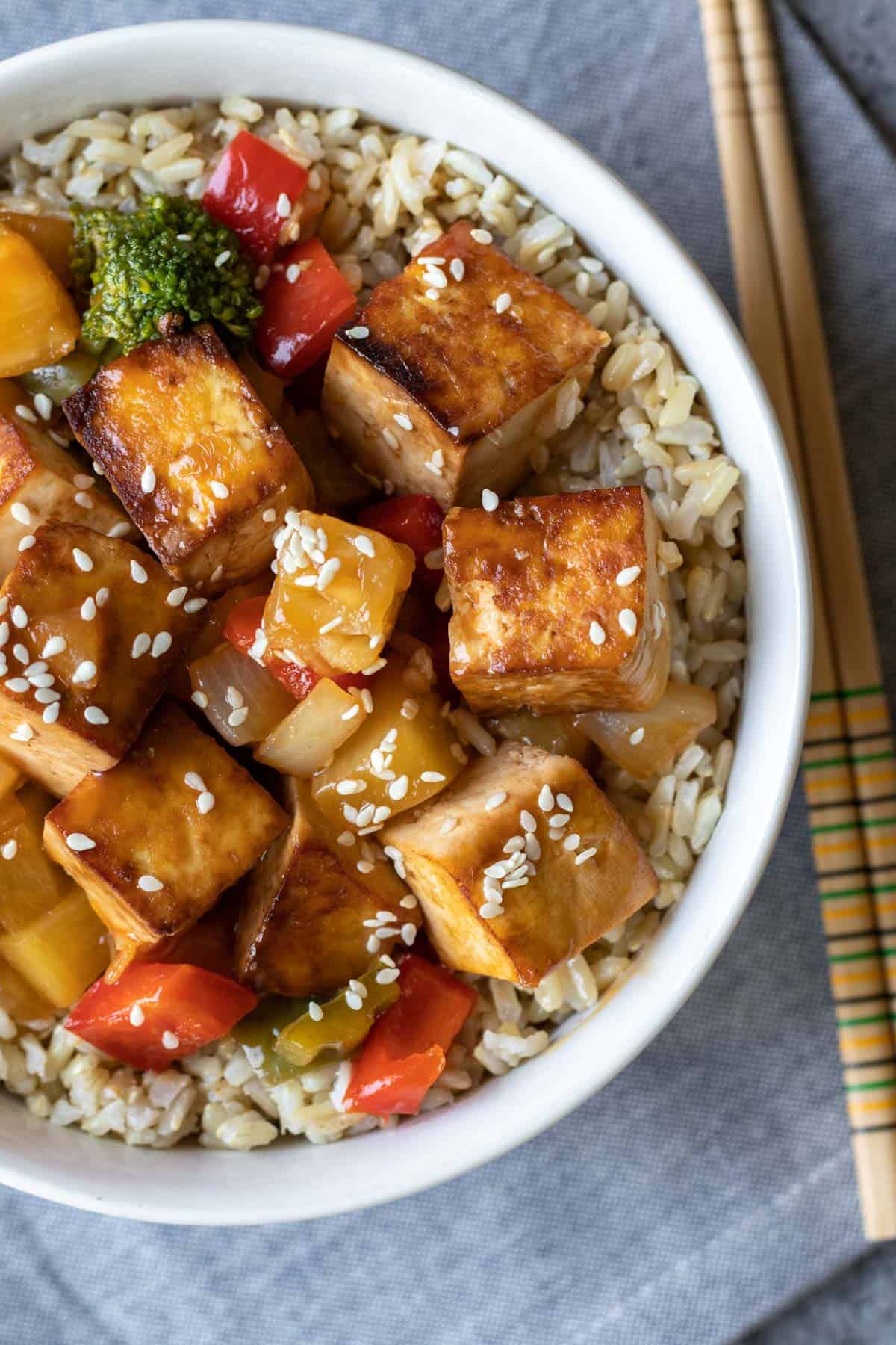 overhead close up of sweet and sour tofu in bowl.