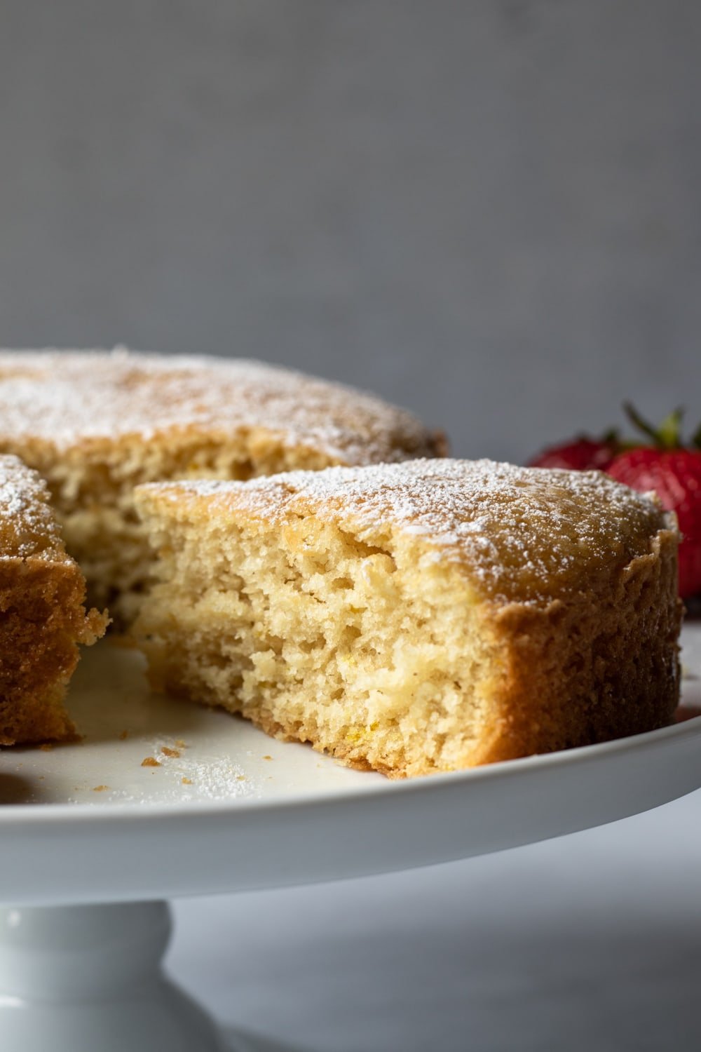 side close up view of a slice of yogurt cake.