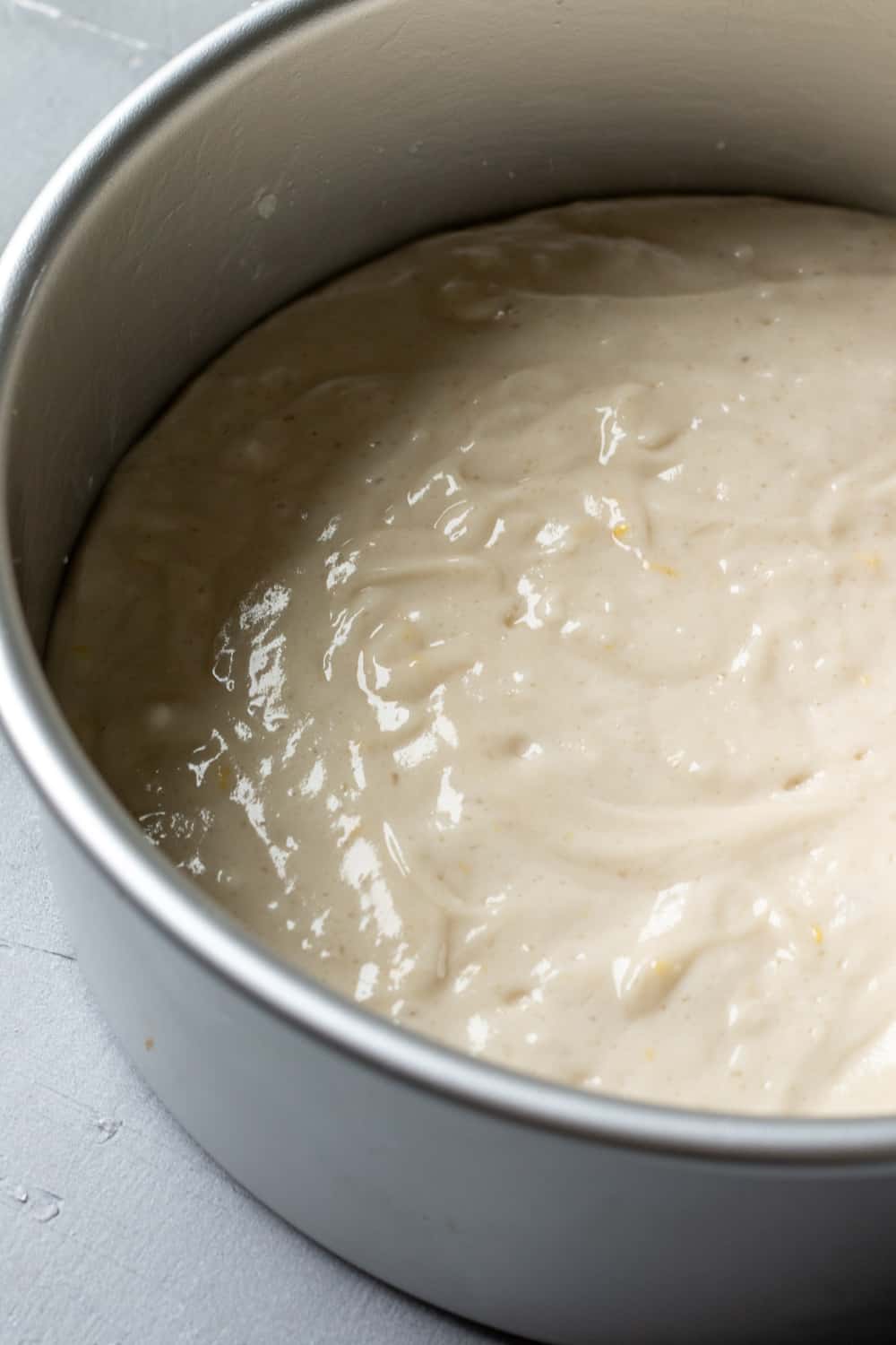 thick cake batter in an 8-inch cake pan.