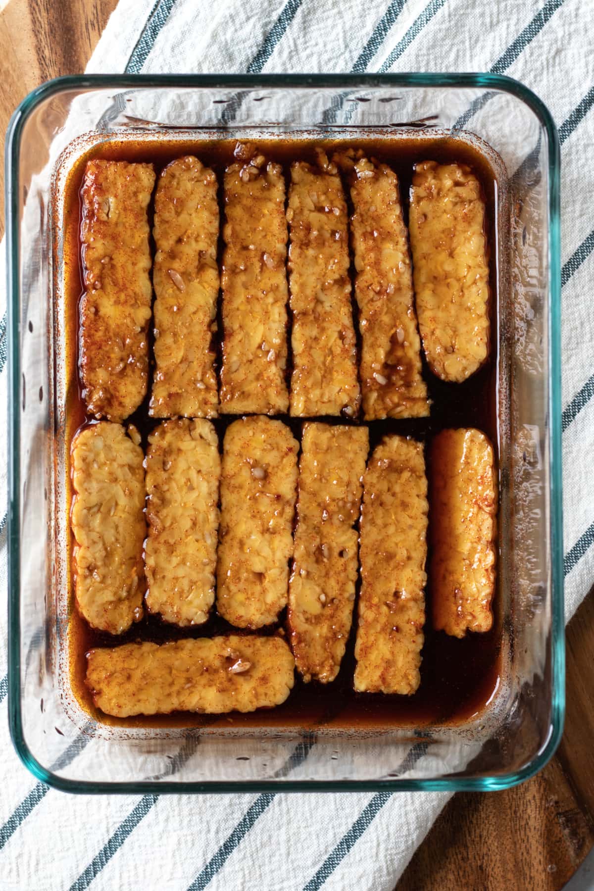 marinating tempeh in smoky/sweet mixture.