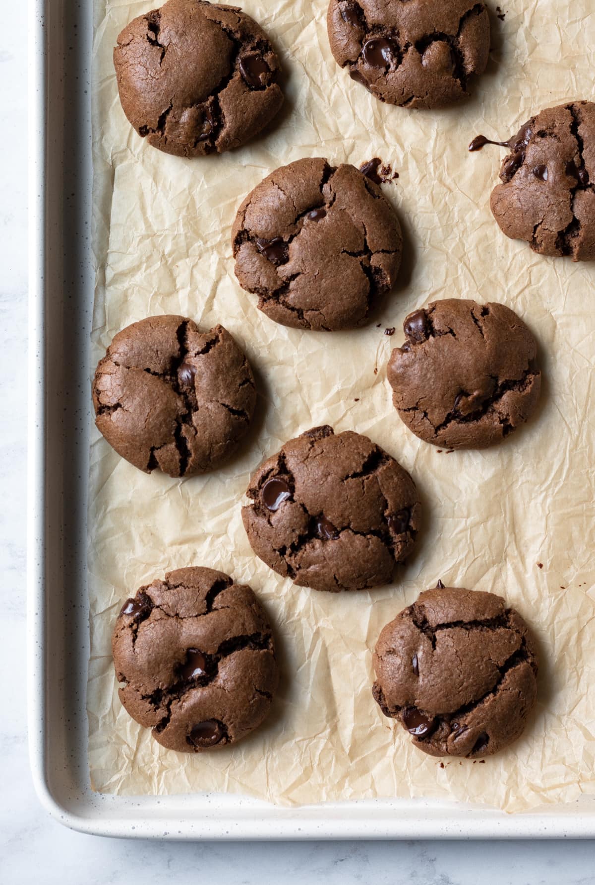 overhead shot of cookies on a parchment-lined pan.