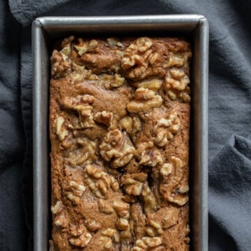 close up overhead of healthy banana bread in a loaf pan