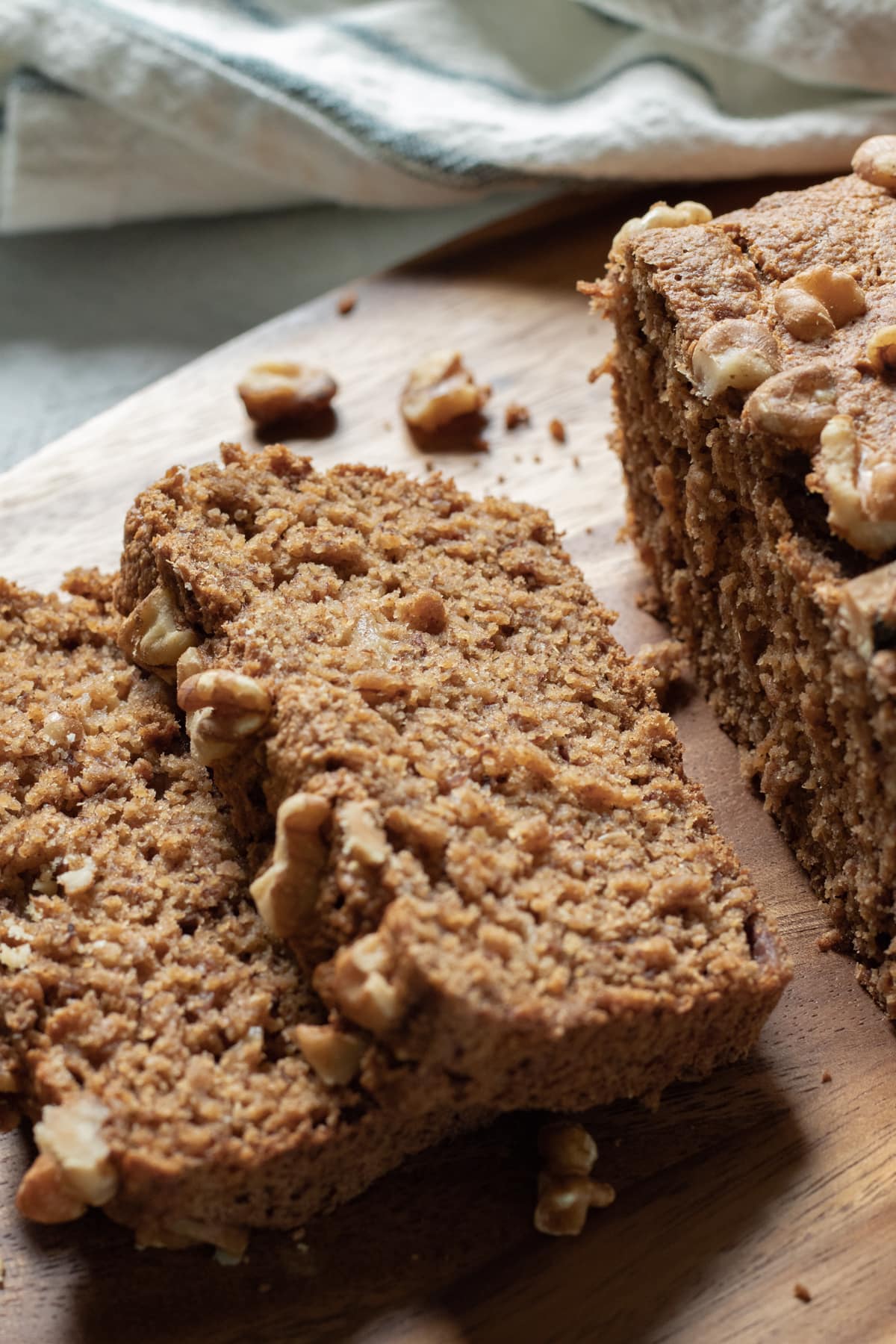 sliced oat flour banana bread showing the moist and hearty texture.