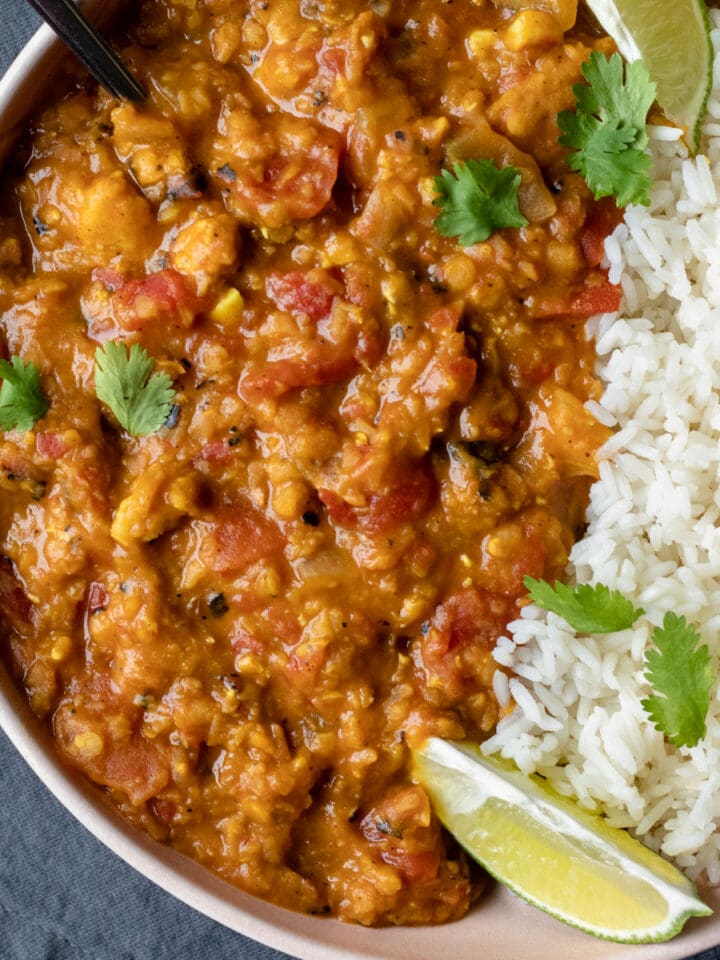 close up overhead of Instant Pot Lentil Curry and rice in a bowl