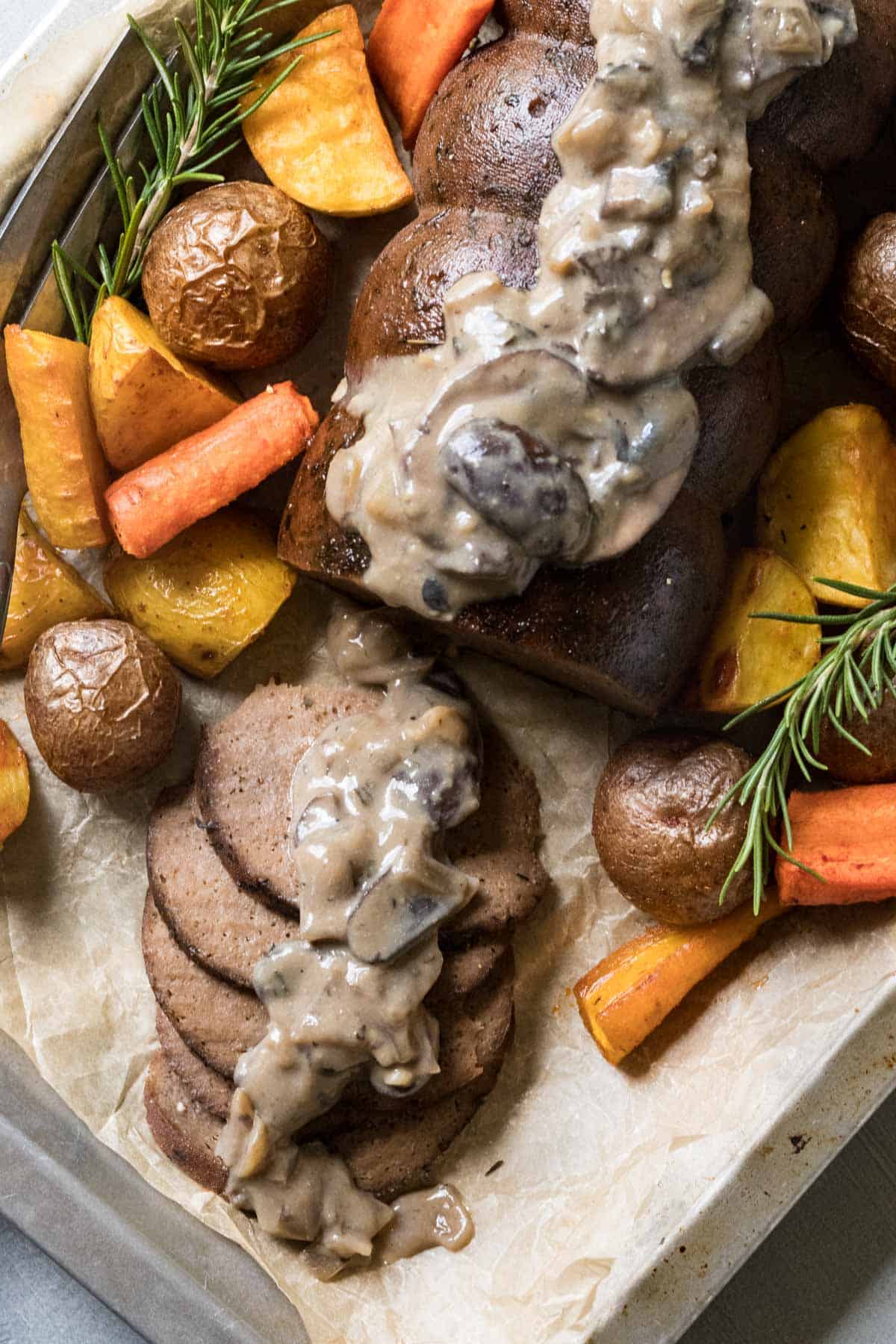 overhead shot of roast and vegetables on a platter