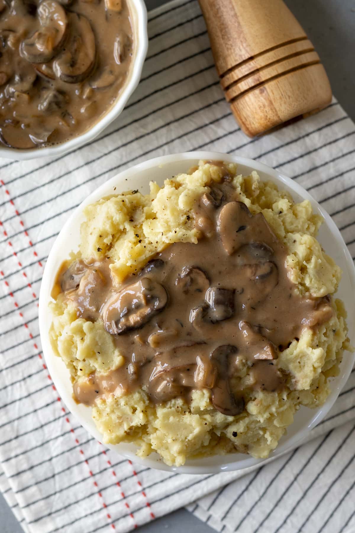 overhead photo of creamy vegan gravy on mashed potatoes.