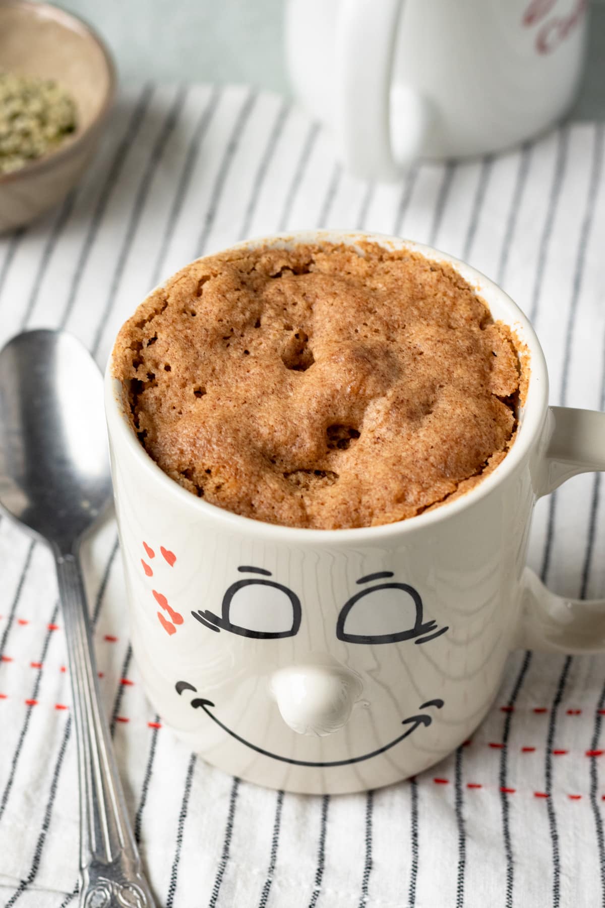 showing texture of the top of the mug muffin / mug cake when it comes out of the microwave