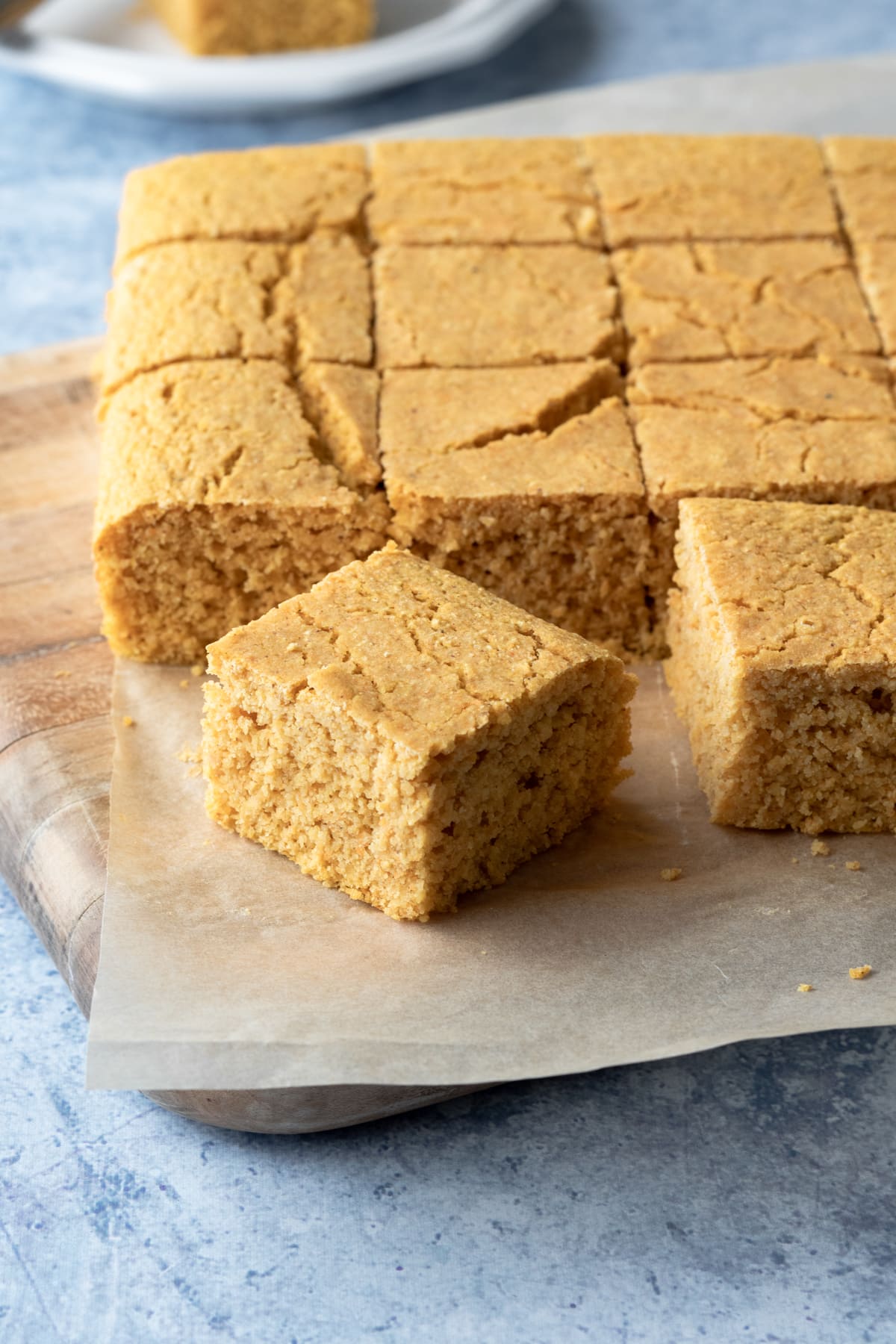 sliced batch of cornbread on a cutting board