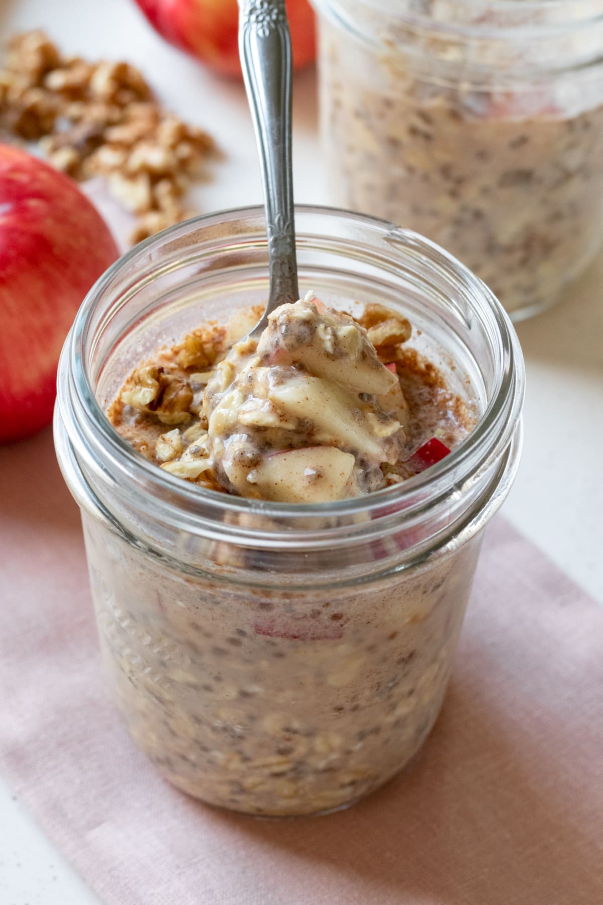 scooping up oats with a spoon.