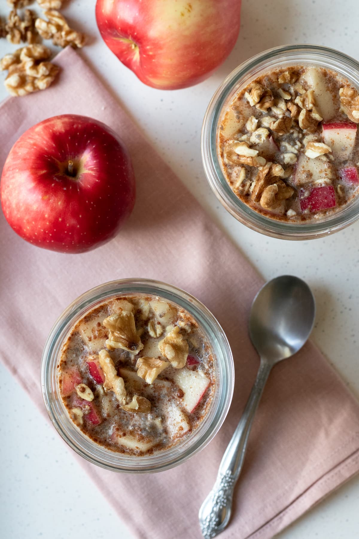 two jars filled with overnight oats that have already chilled.