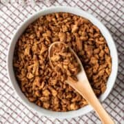 close up of crunchy soy curl bacon bits in a jar