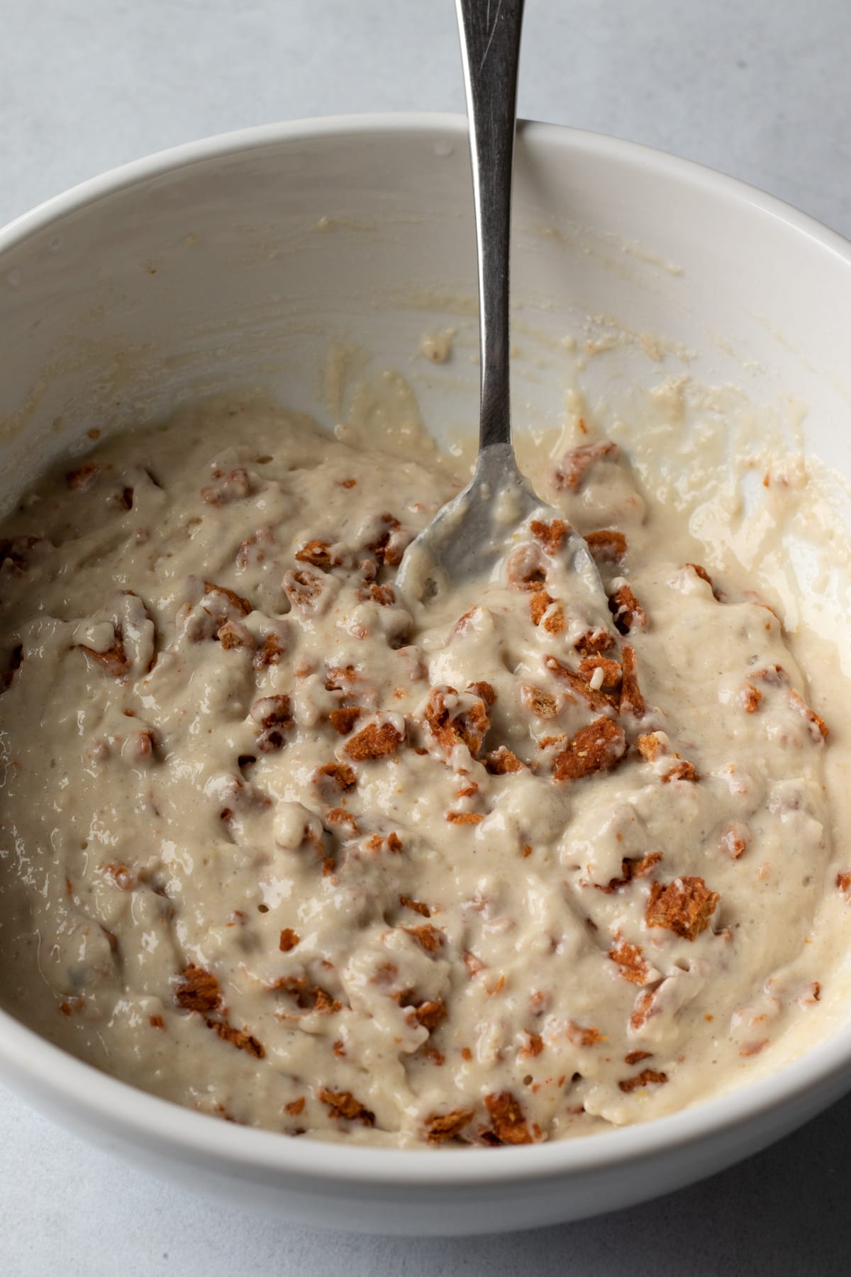 folding vegan bacon into pancake batter