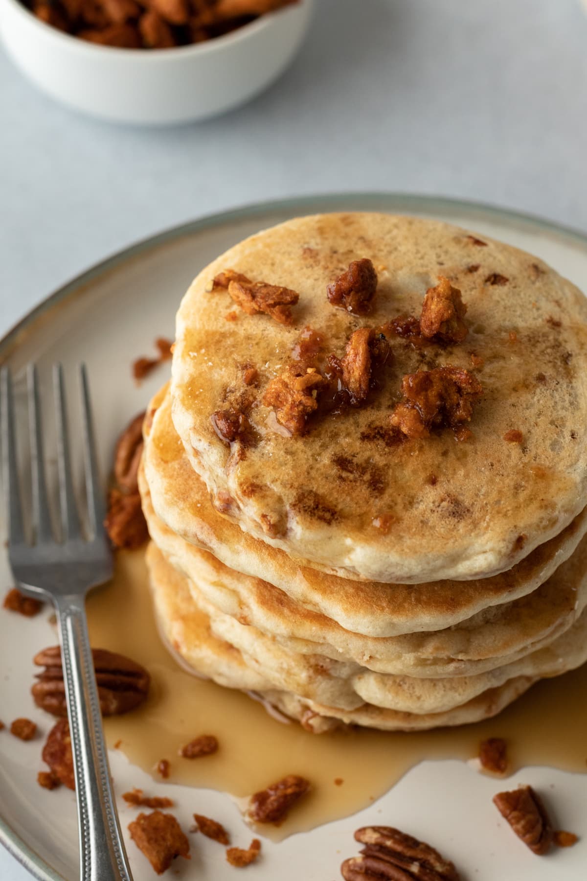 looking down at vegan bacon topped pancakes