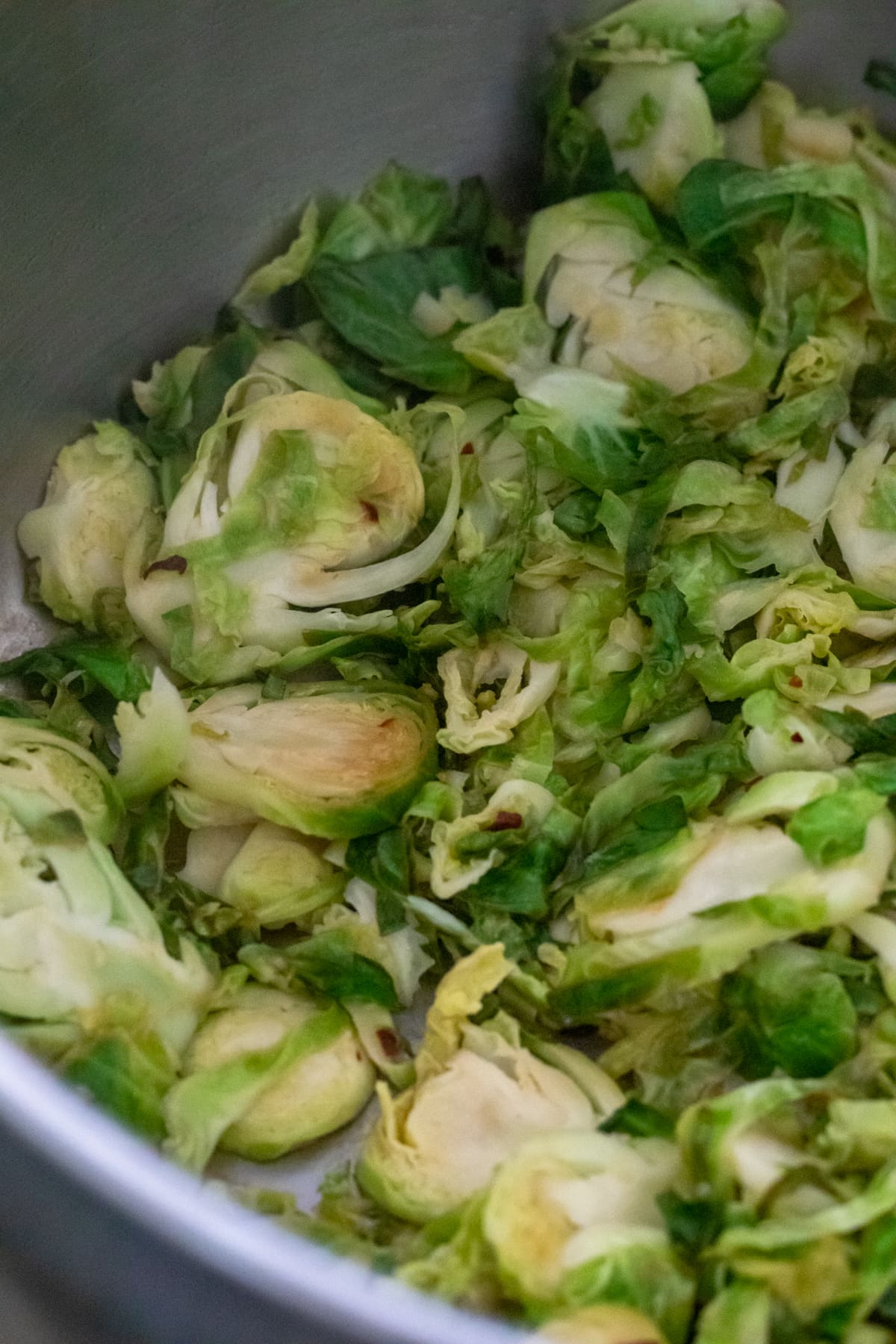 sautéing shredded brussels sprouts with garlic and lemon