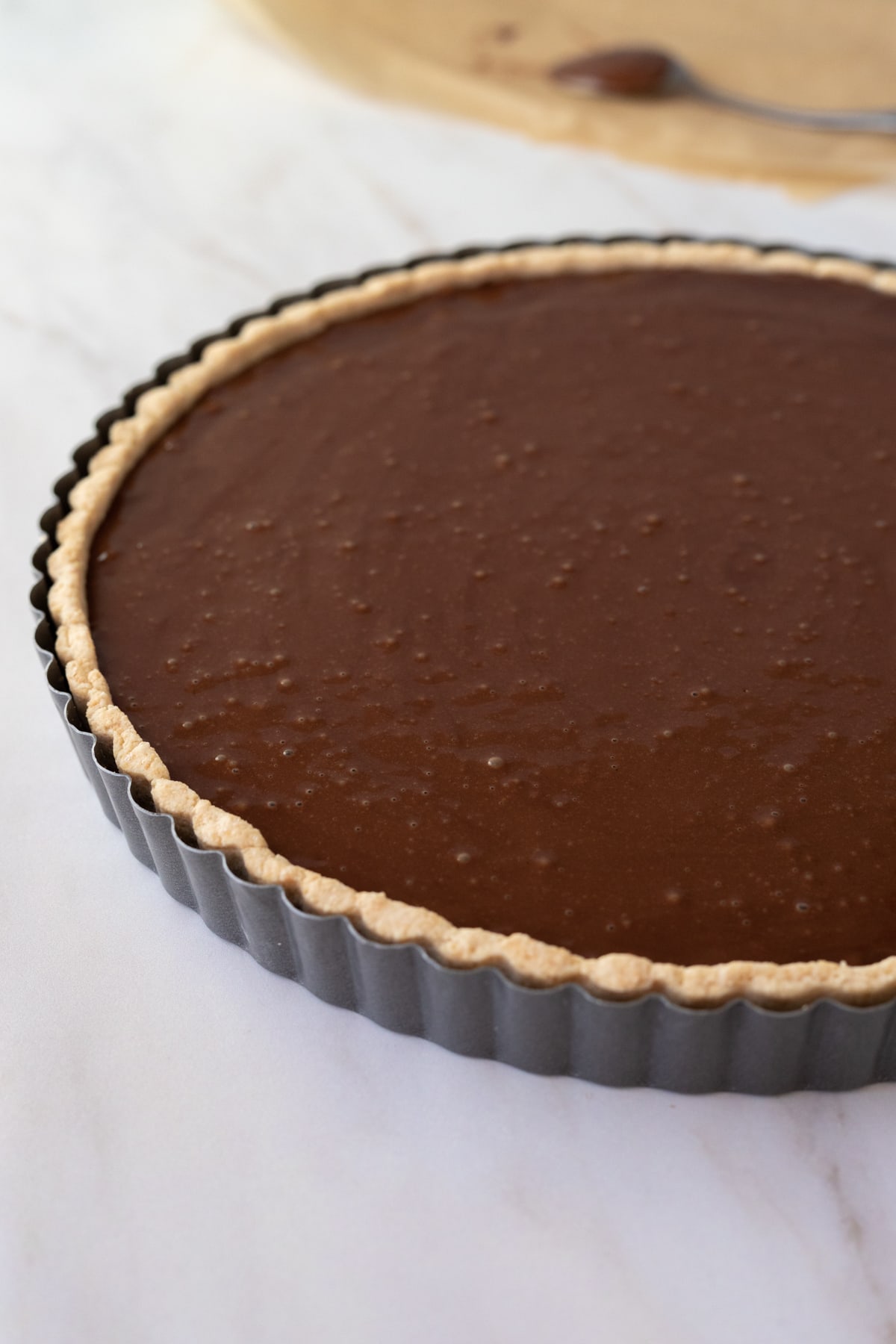 chocolate filling poured into crust, ready to be chilled.