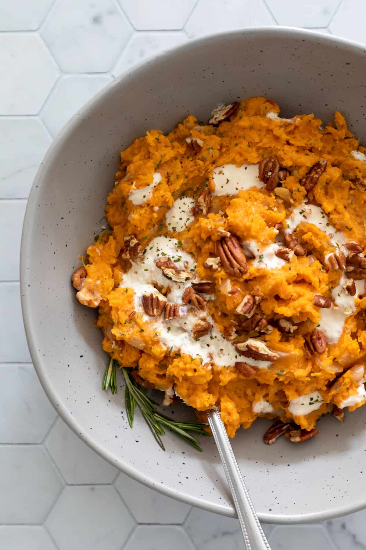 mashed sweet potatoes in a large serving bowl