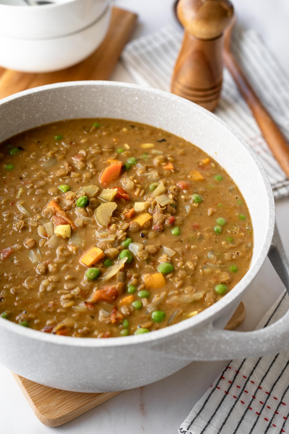 colorful curry lentil soup in a pot for serving