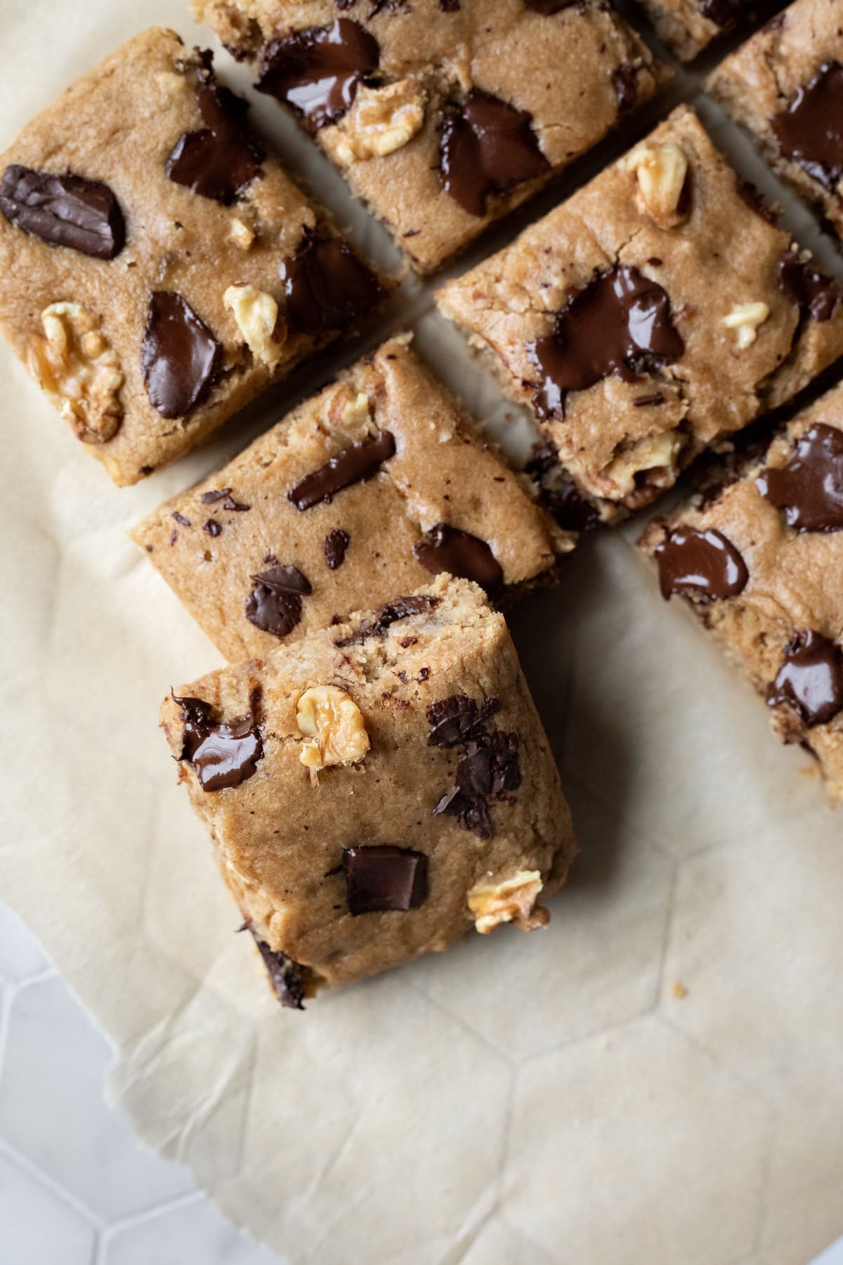 blondies cut with one on side showing moist texture