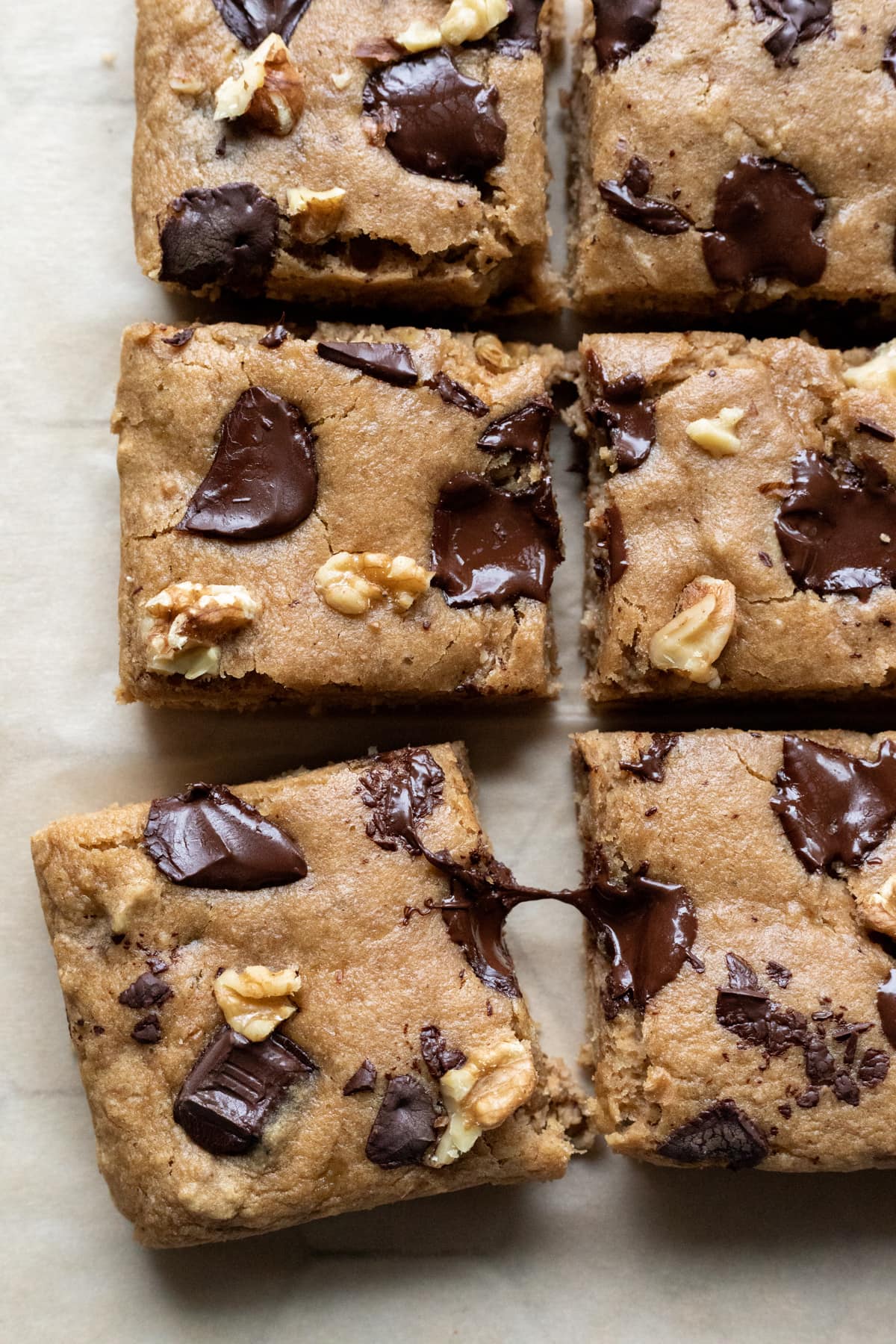 banana blondies with melty warm chunks of chocolate on top