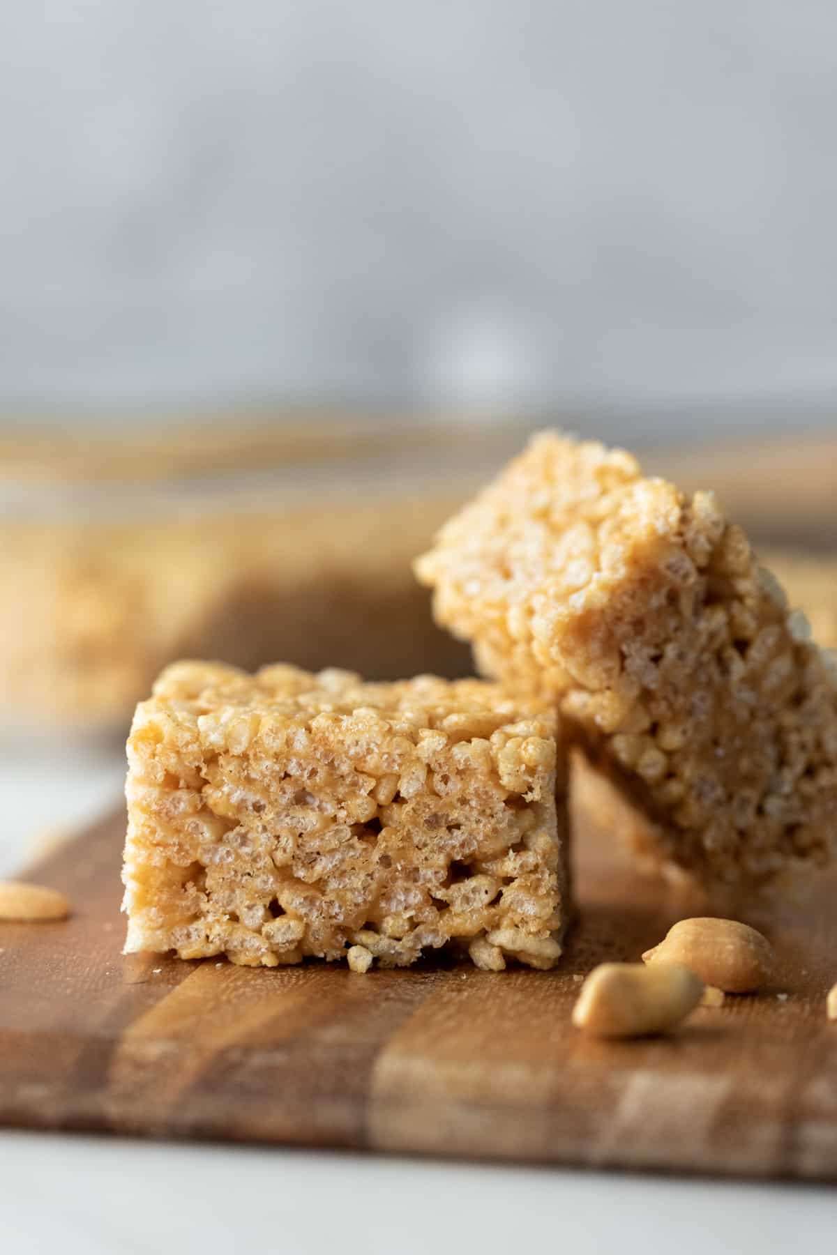 close up side view of 2 nice krispie squares.