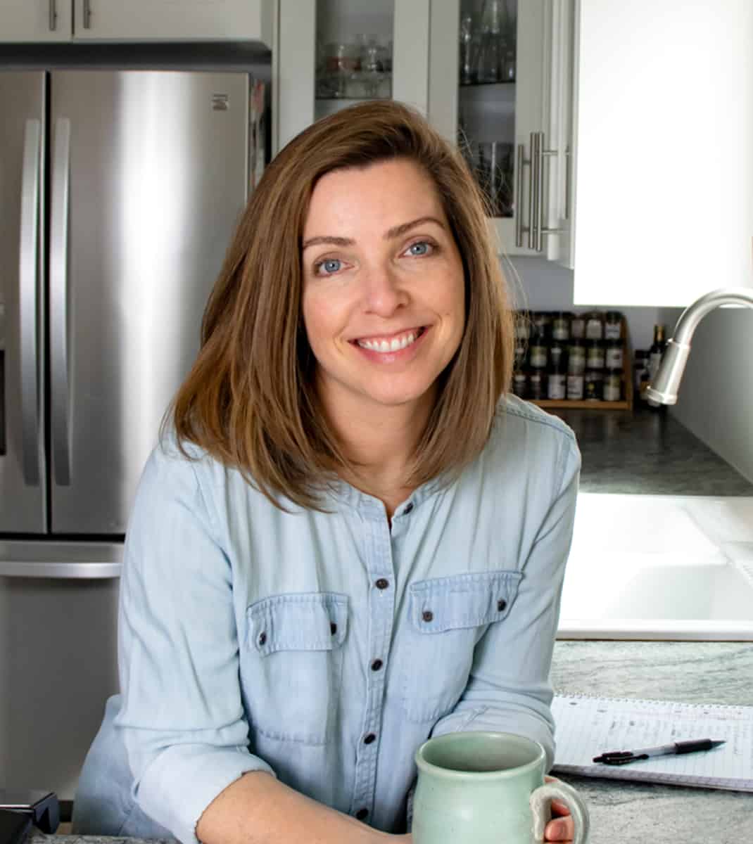author Lori Rasmussen in her kitchen