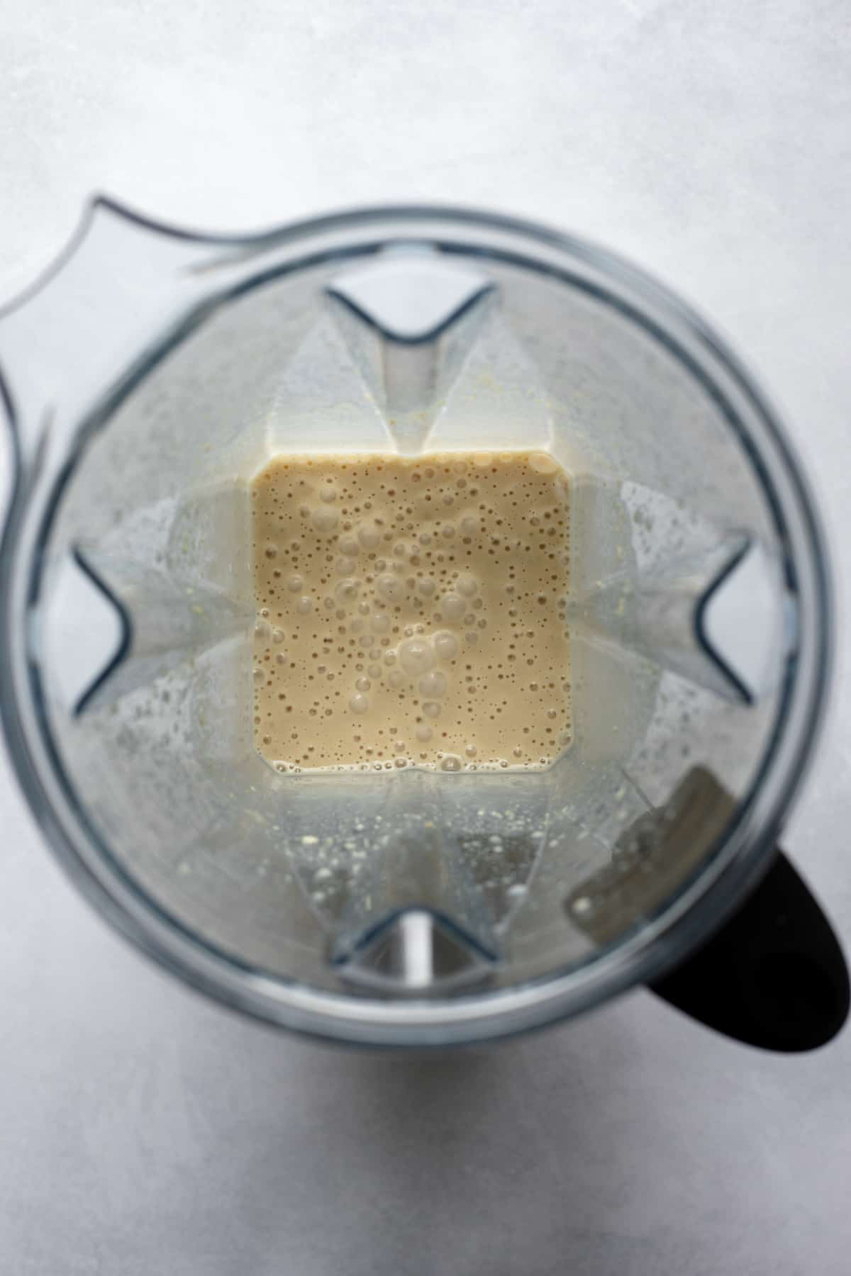 sweetened cashew milk inside a blender.