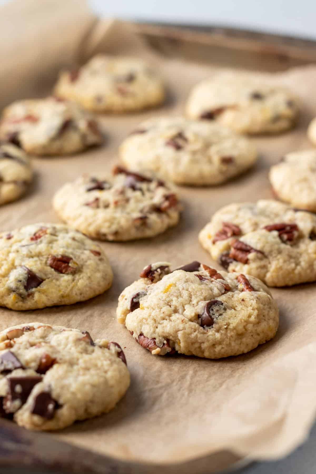 chocolate chunk cookies on a parchment-lined baking sheet.