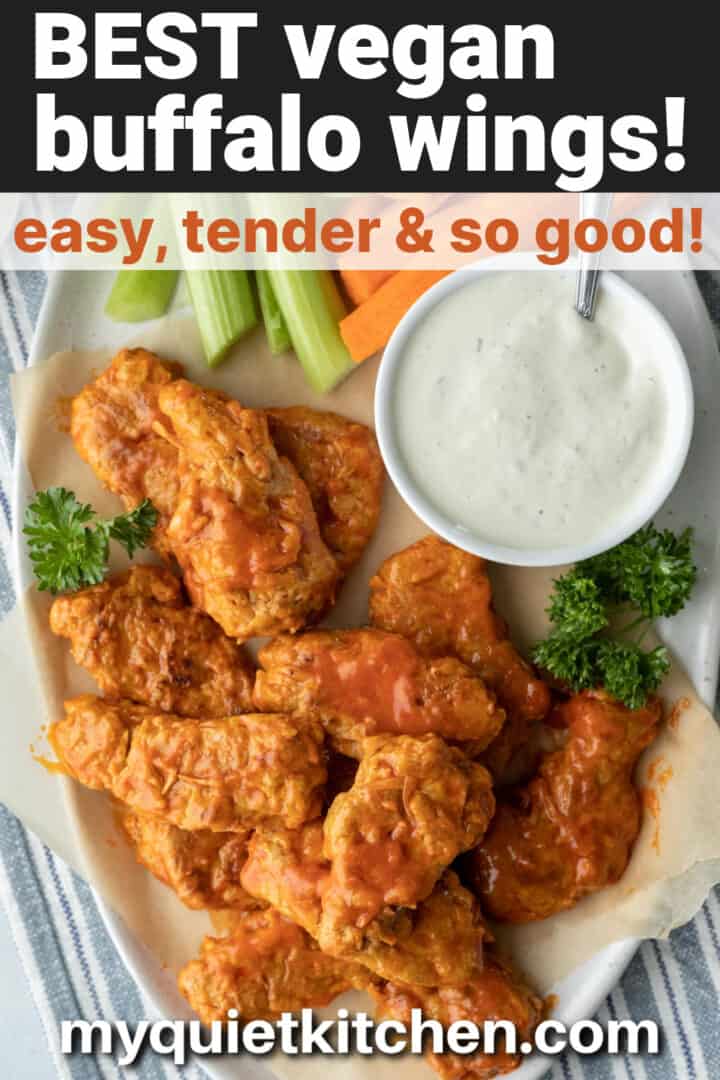 a platter of wings with title text overlay to save on Pinterest.