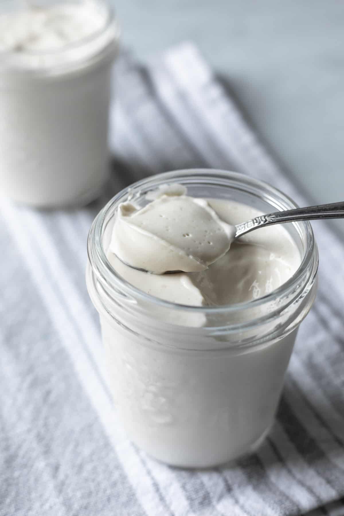a spoonful of thick vegan almond yogurt.
