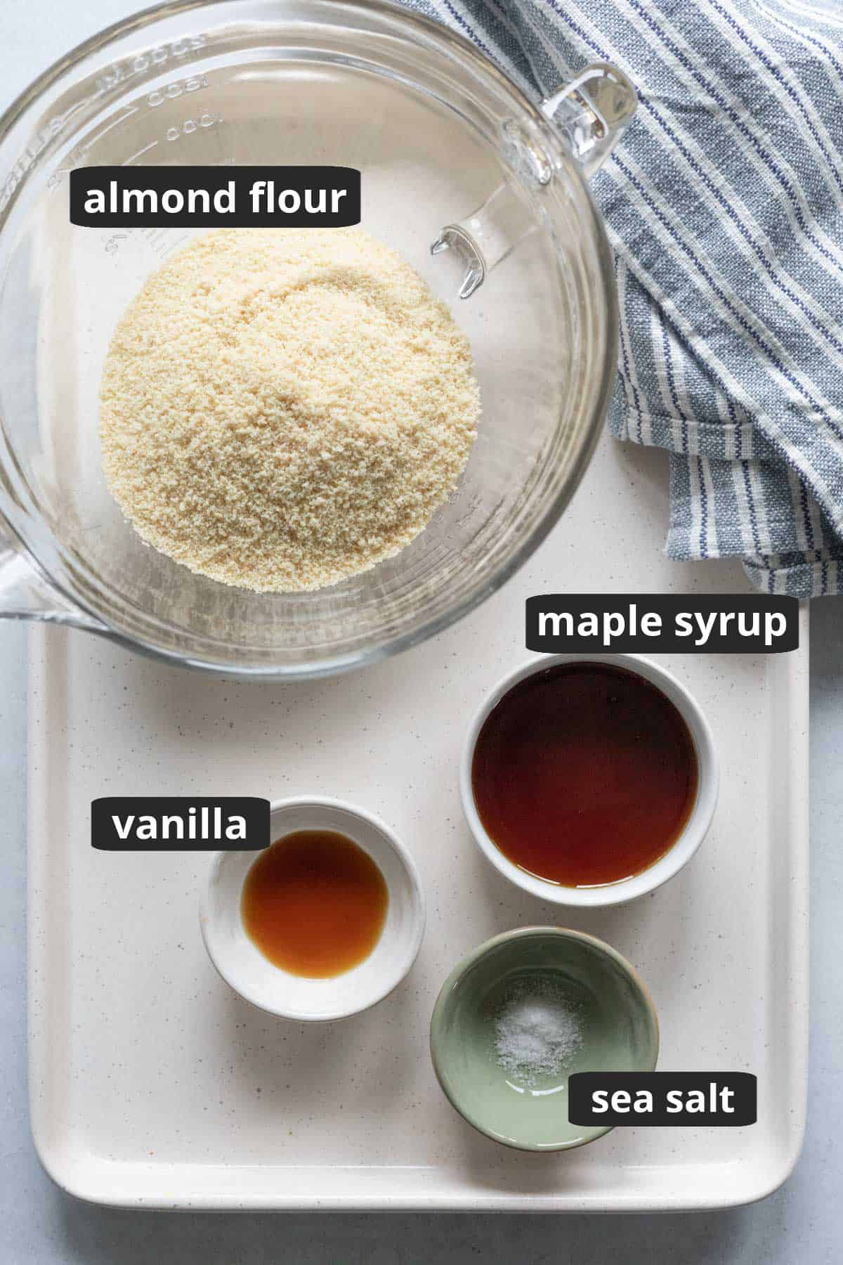 a labeled photo of the ingredients needed for grain-free almond cookies.