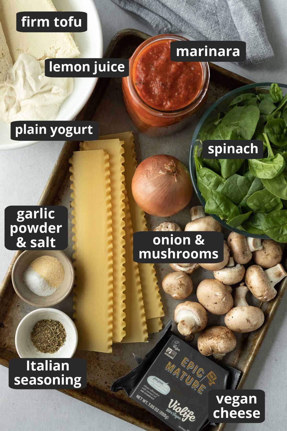 labeled photo of the 12 ingredients needed to make the best vegan lasagna.