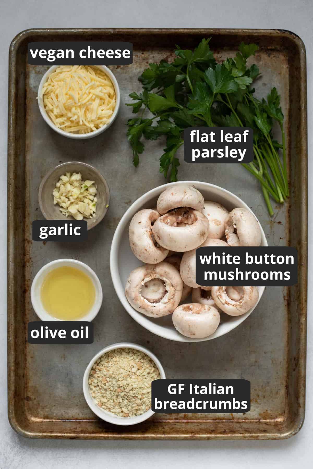 labeled photo of the six ingredients needed to make easy stuffed mushrooms.