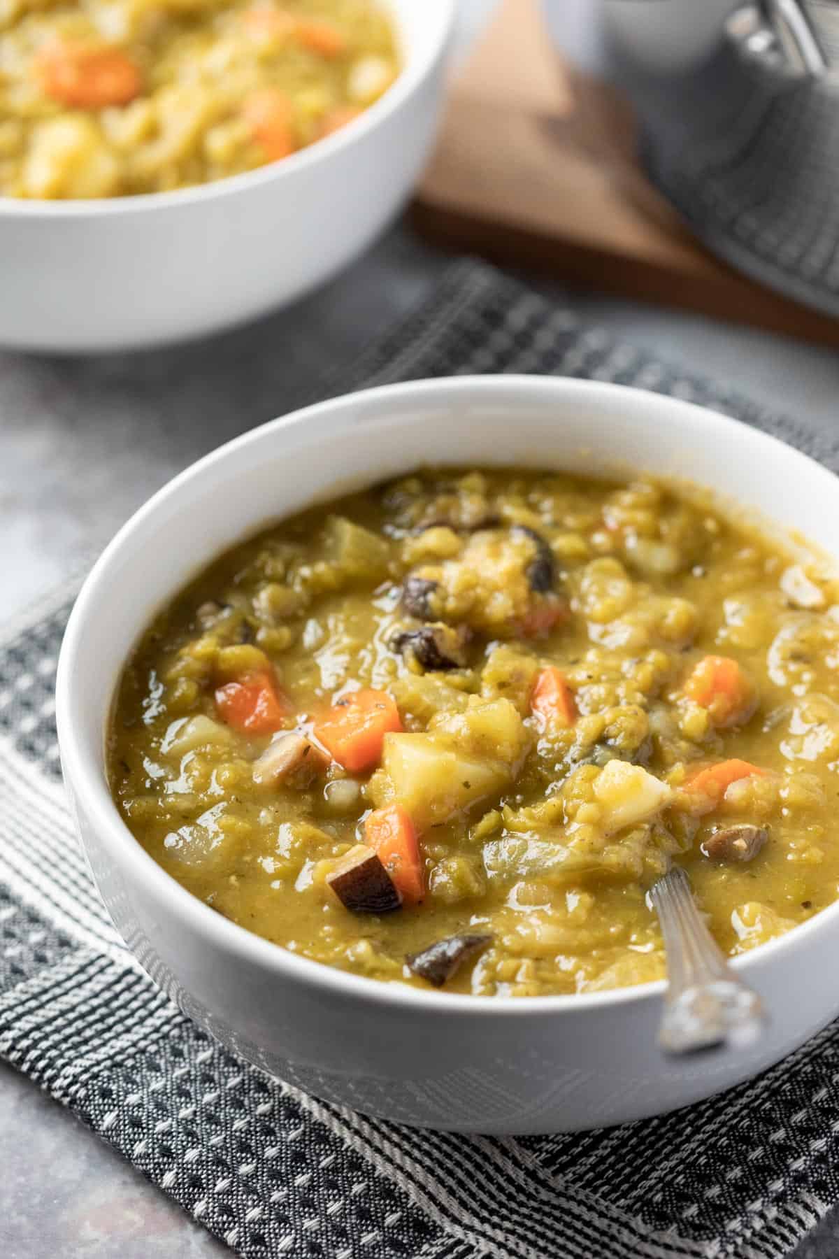 bright photo of colorful and creamy vegan split pea soup.