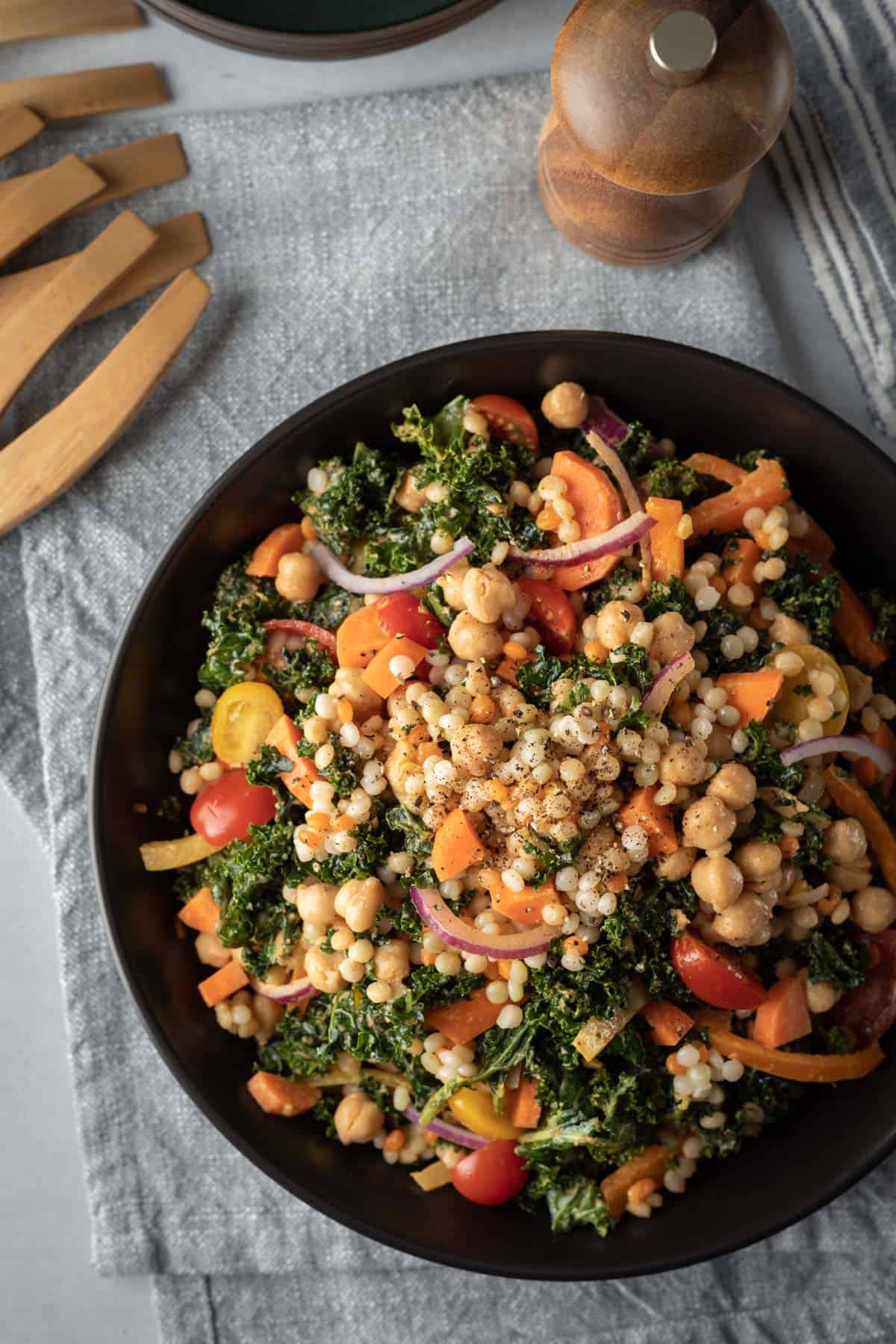 overhead photo of couscous kale salad showing a variety of colors and textures.
