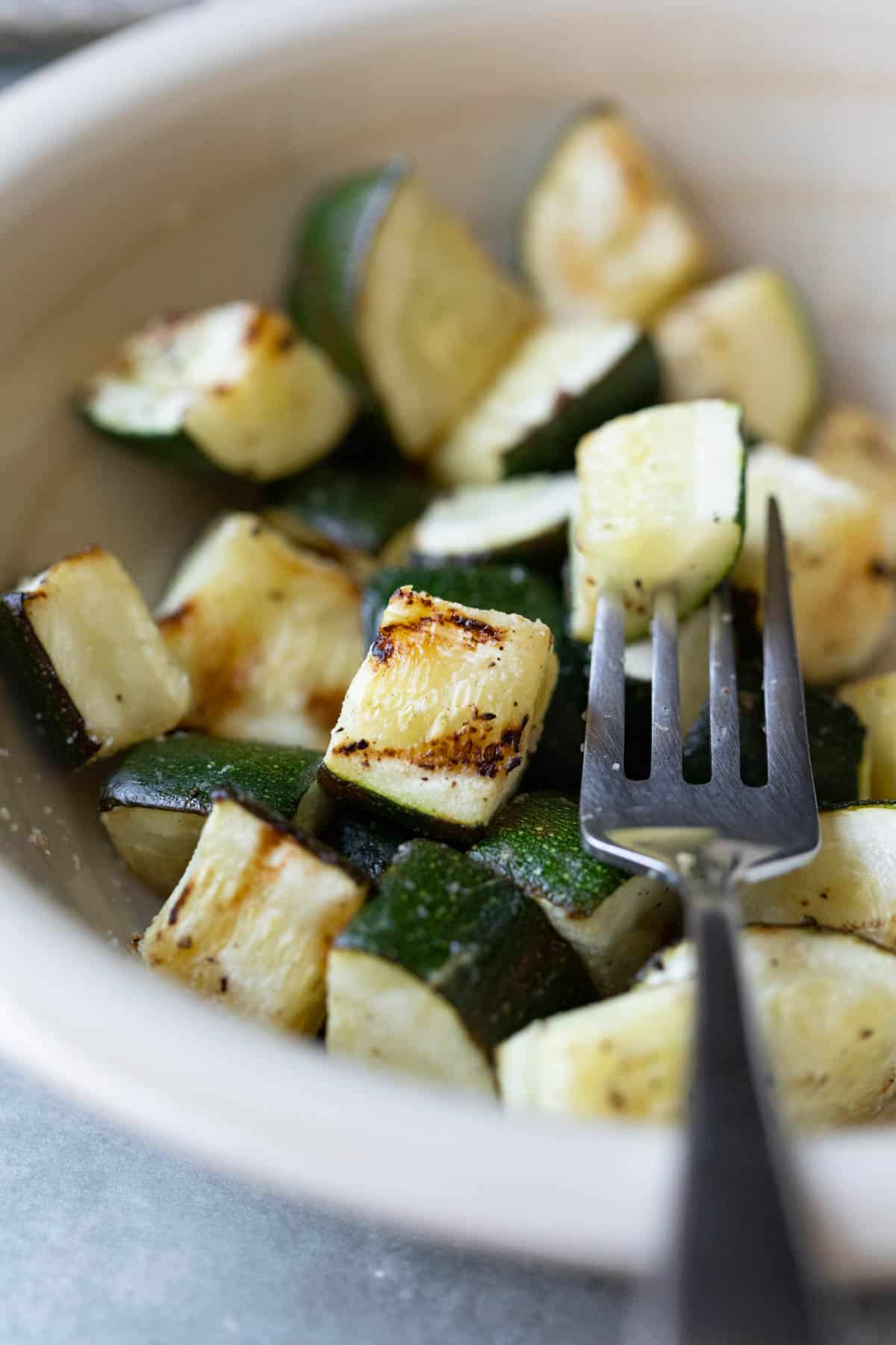 close up shot of lemon air fryer zucchini without oil.