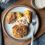 overhead view of air fryer peaches with caramelized maple tahini on top.