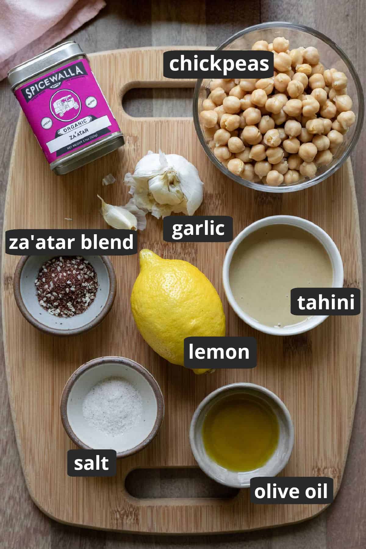 labeled photo of the 7 ingredients needed to make za'atar hummus.