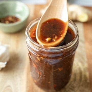 Homemade Korean barbecue sauce in a small glass jar.
