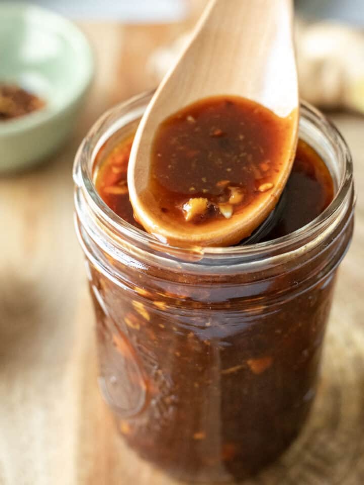 Homemade Korean barbecue sauce in a small glass jar.
