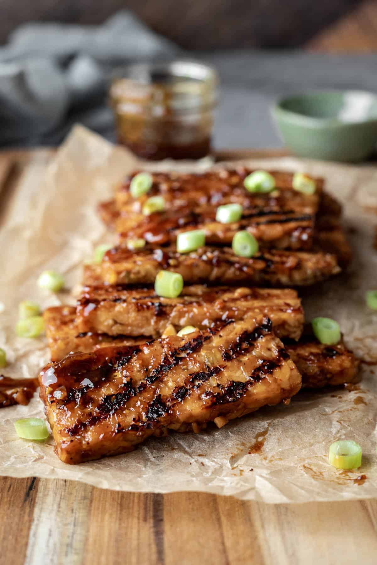 slabs of tempeh that have been pan-grilled and cooked in spicy Korean BBQ sauce.