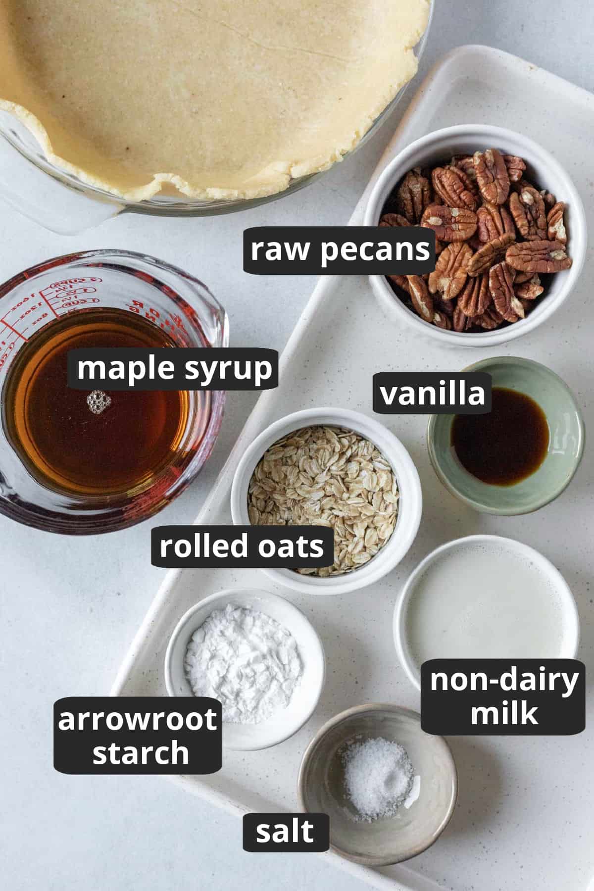 labeled photo of the 7 ingredients needed to make healthy vegan pecan pie.