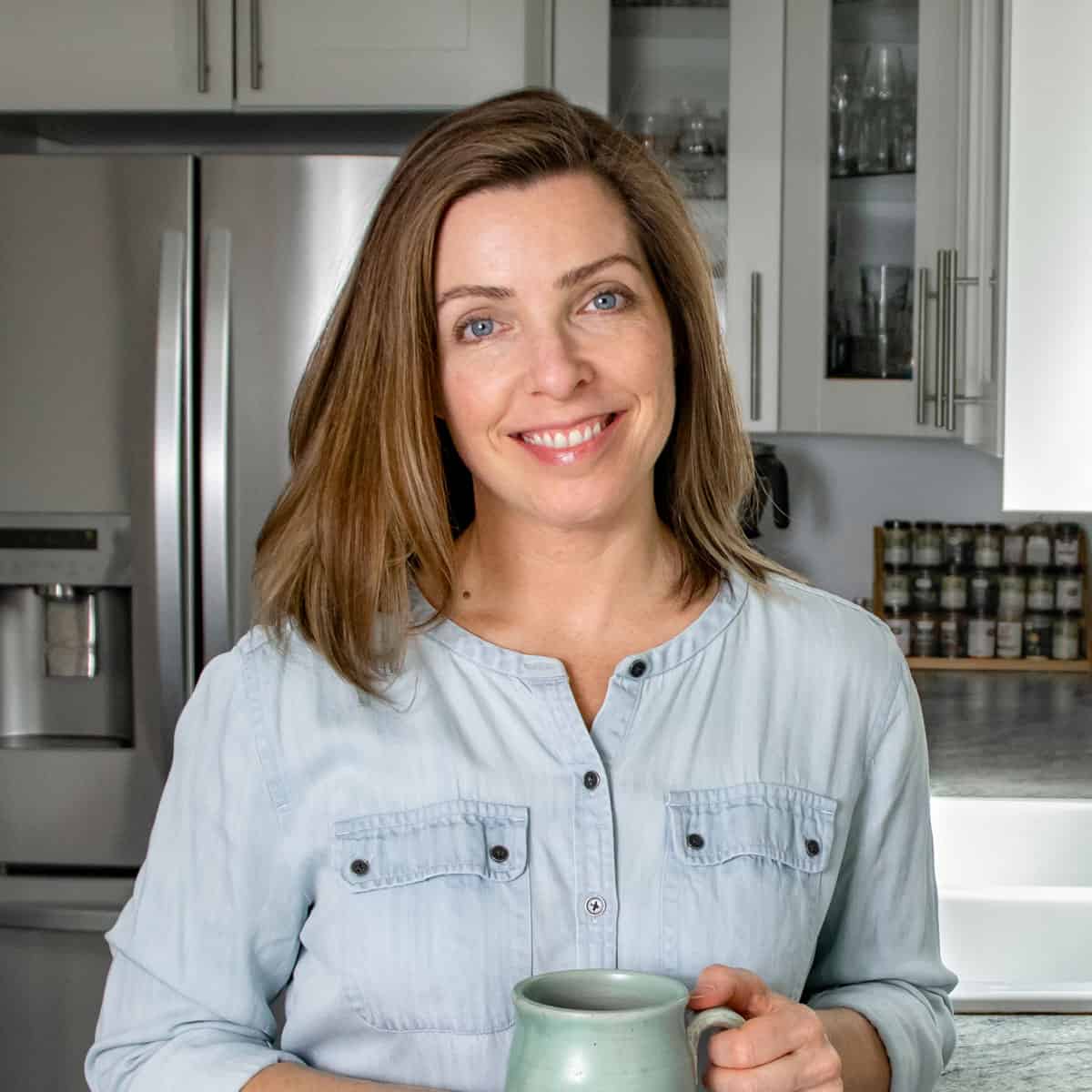 the author standing in her kitchen.