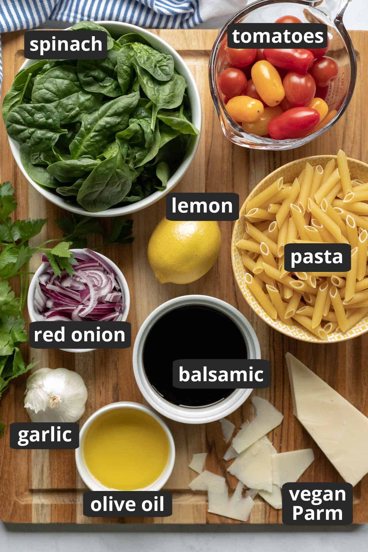 labeled photo of the nine ingredients needed to make pasta fresca at home.