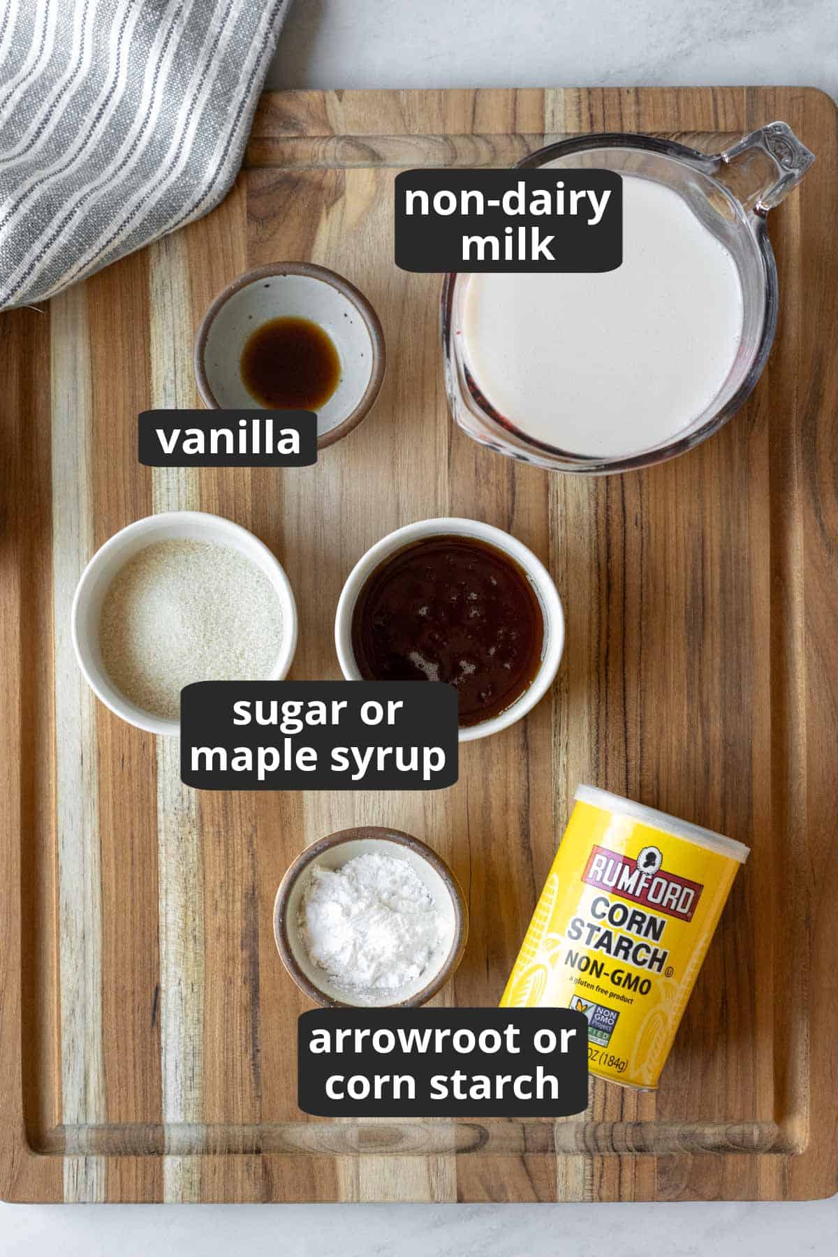 Labeled photo of the four ingredients needed for vegan vanilla pudding.