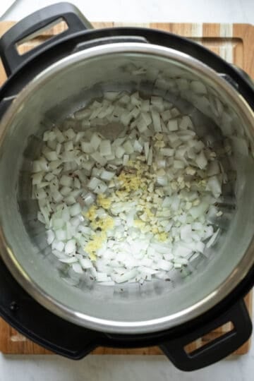 Sauteing onion and garlic in the Instant Pot.