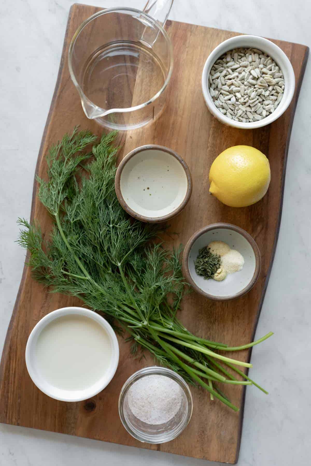 The 10 ingredients needed for vegan dill salad dressing.