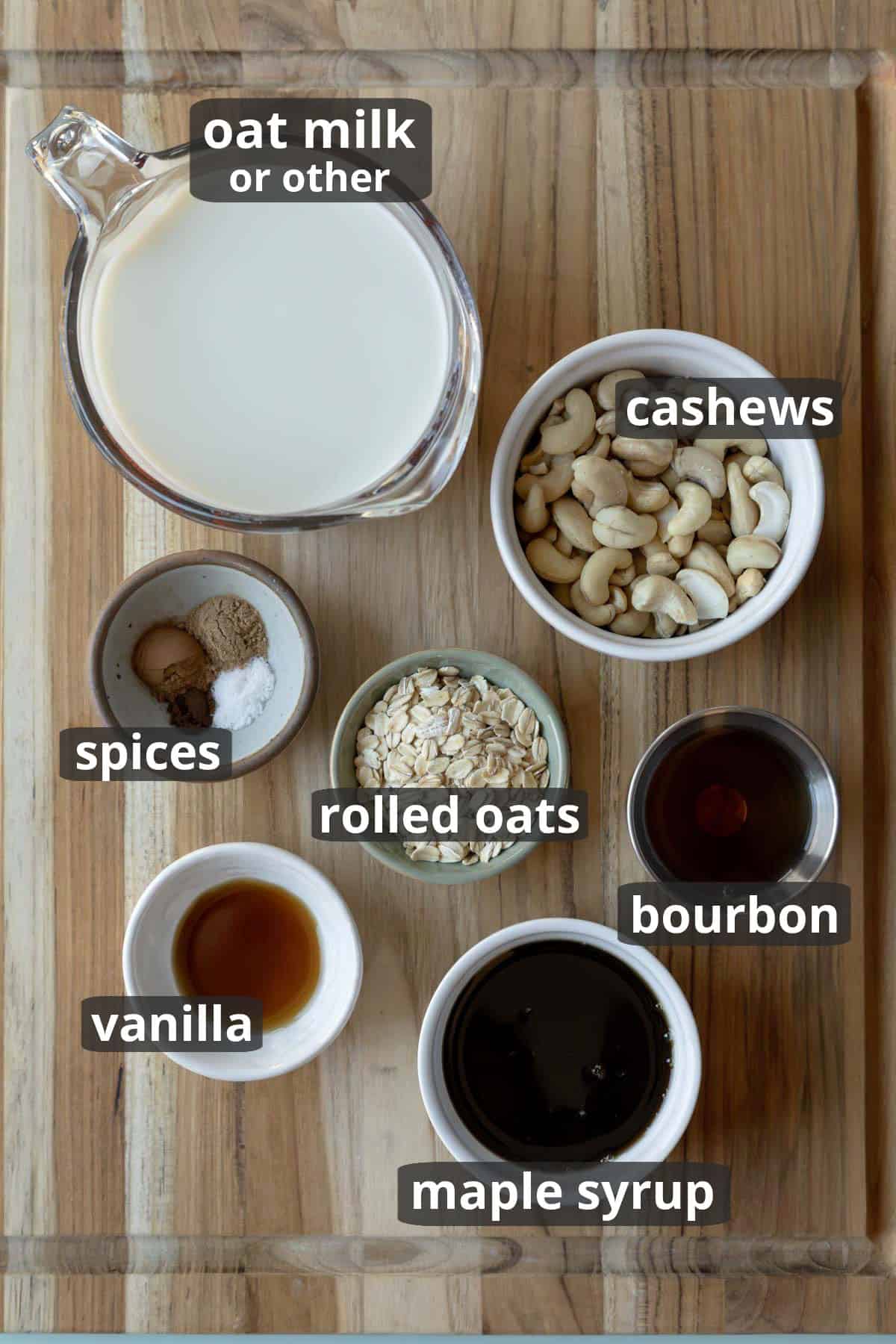A labeled photo of the 9 ingredients needed to make vegan eggnog ice cream.