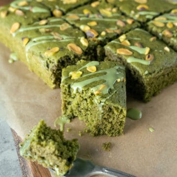 Matcha cake drizzled with green matcha icing.